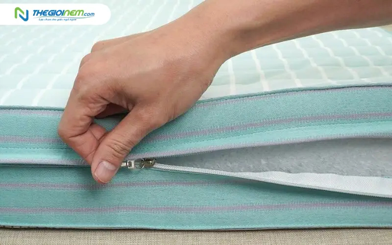 Tháo và xử lý vỏ nệm bông ép